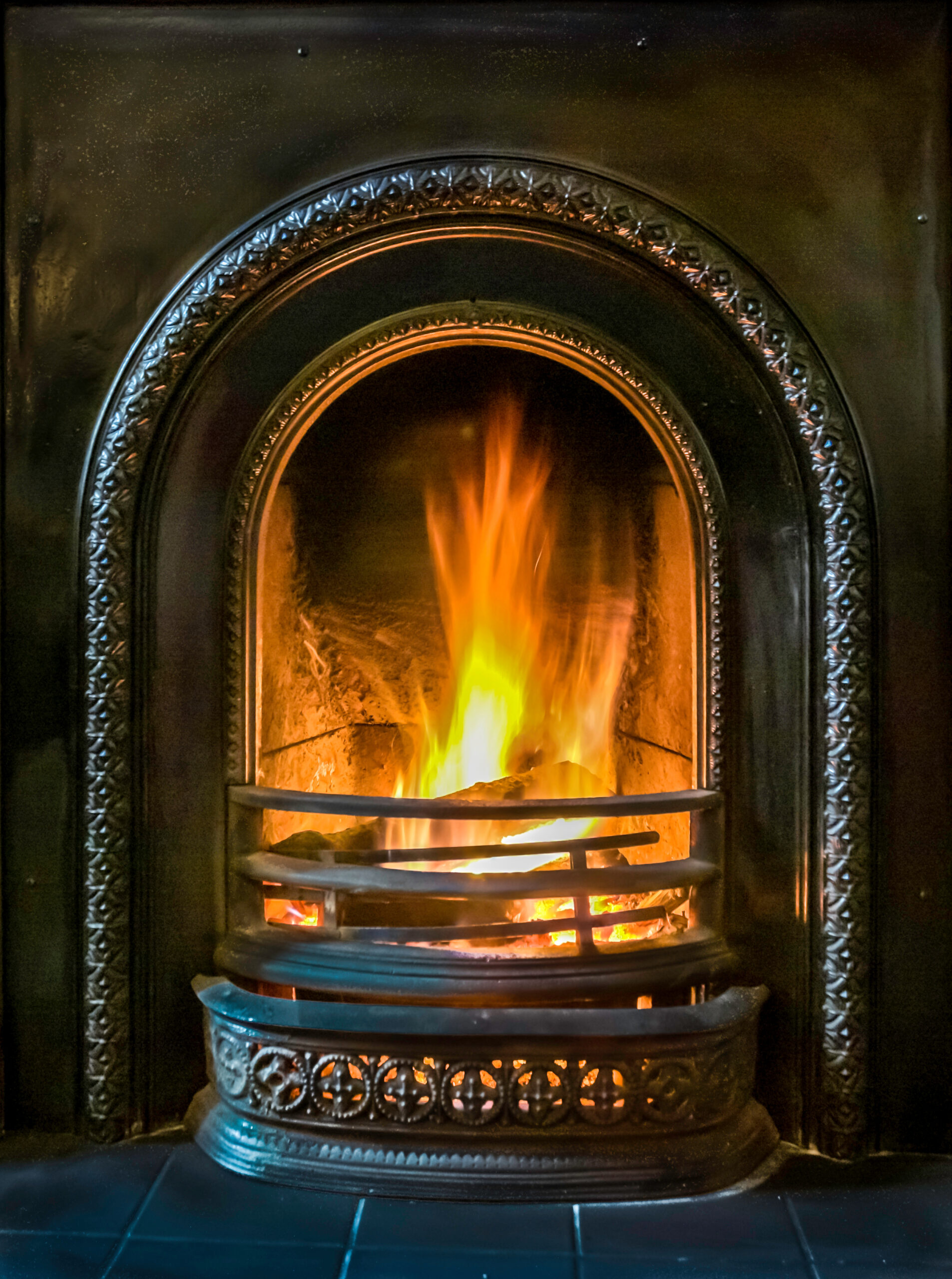 Cosy old Victorian open fire burning.