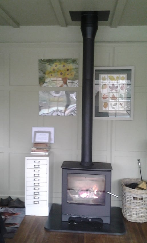 Small space stove solution 1, aMendip Woodland stove in artists studio