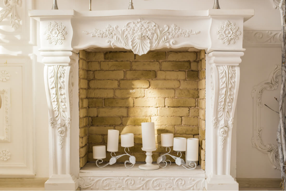 Empty fireplaces with candles