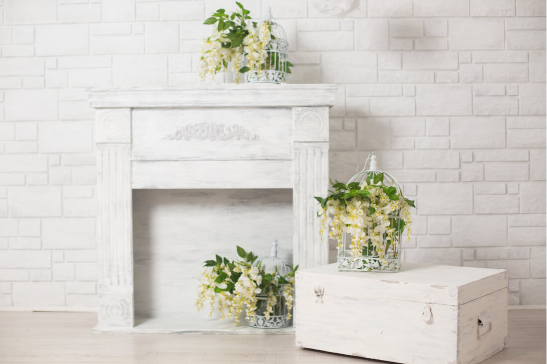 Empty fireplaces with flowers