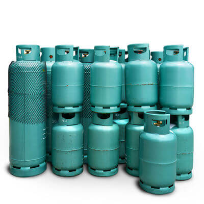 Different size green LPG propane tanks